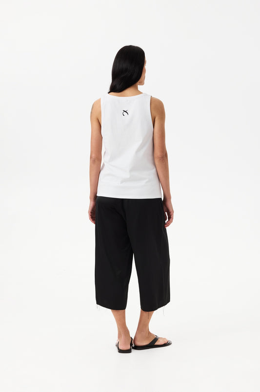 White top with logo